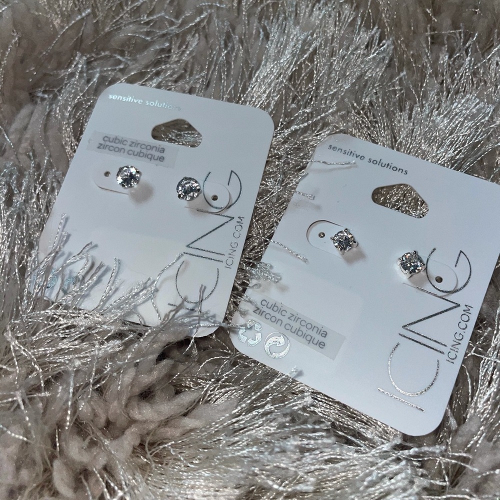 two pairs of Icing earrings (square and circular)